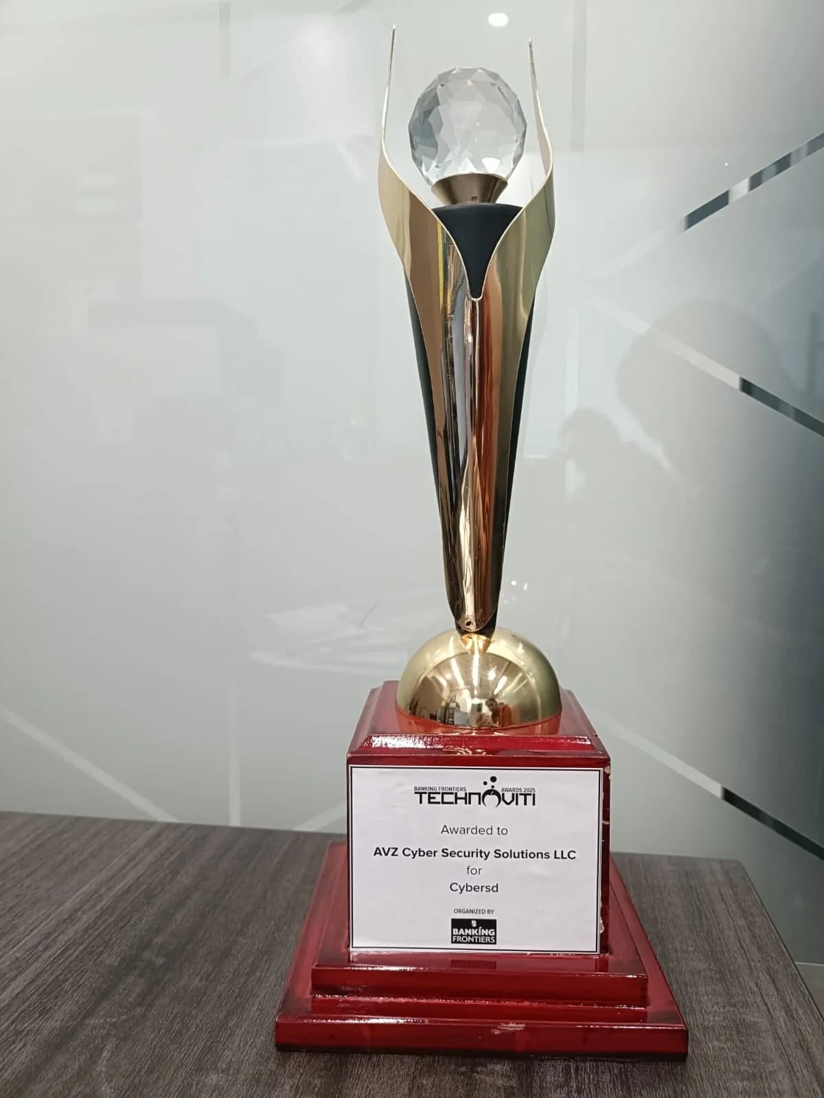 A crystal trophy engraved for AVZ Cyber Security Solutions LLC for CyberSol